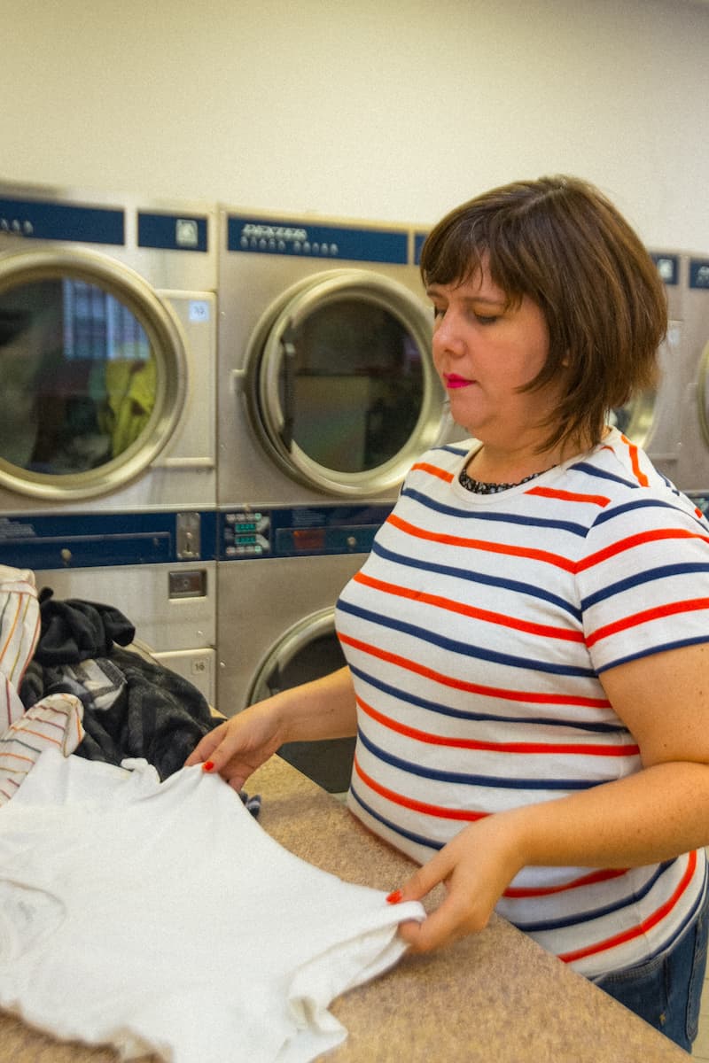 Like most neighborhood renters, Emily spends a lot of time at the laundromat.